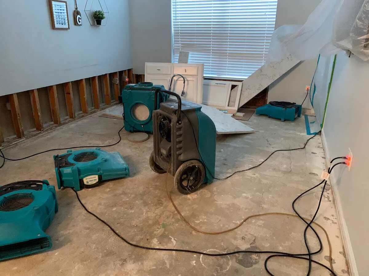Dehumidifier in flood-cut room for Water Damage Restoration in Trenton